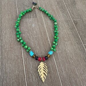 Green and Gold Beaded Necklace with Leaf Pendant